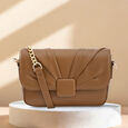 Fastrack Soft-Pleated Sling Bag with Metal Chain Accents  in Tan - image number 0