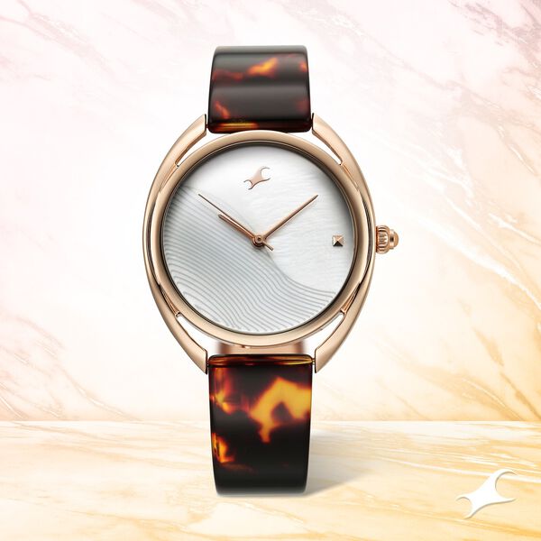 Fastrack Younique Quartz Analog Mother Of Pearl Dial Acetate And Metal Strap Watch For Girls - image number 0