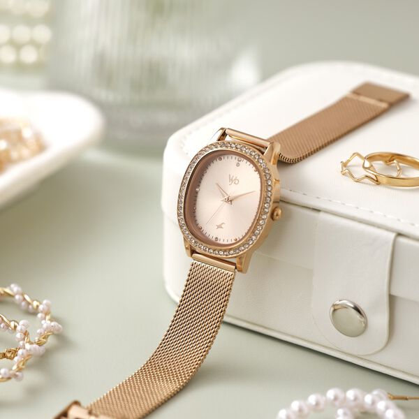 Fastrack Vyb Mirage Quartz Analog Rose Gold Dial Rose Gold Color Metal Strap Watch For Girls - image number 0